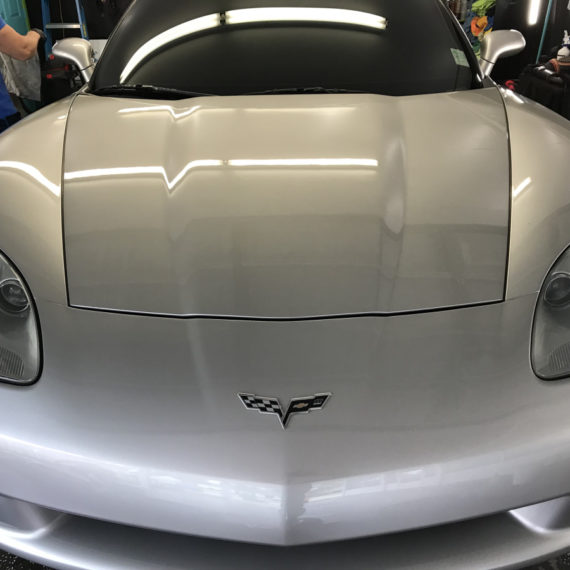 The hood of a Corvette after detailing